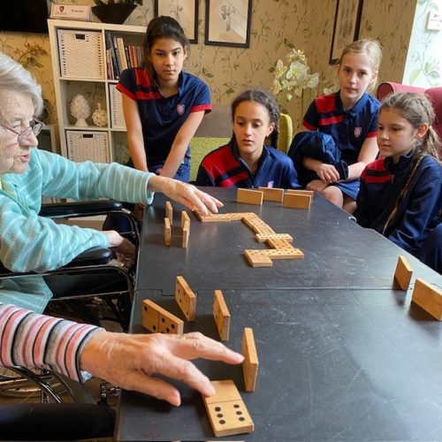 Playing Dominoes with Young and Old