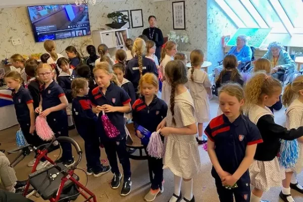 Talbot Heath School bringing joy to residents of Kingsman House