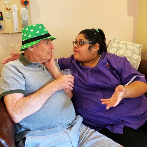 Carer talking with resident