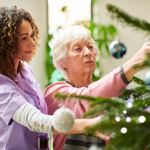 decorating Christmas tree at care home